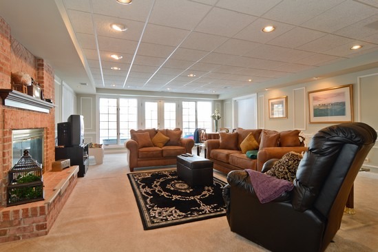 26 Hidden Brook Drive North Barrington, IL 60010 - Photo 16 of 22 a living room with furniture a large window and gym equipment