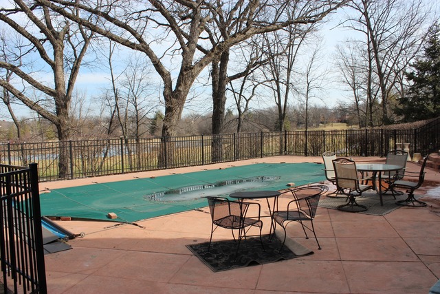 26 Hidden Brook Drive North Barrington, IL 60010 - Photo 18 of 22 a backyard of a house with table and chairs