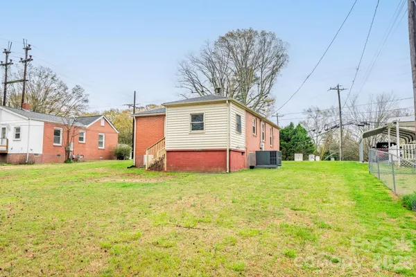 a front view of house with yard and seating