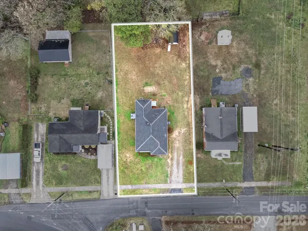 view of a brick wall next to a brick building