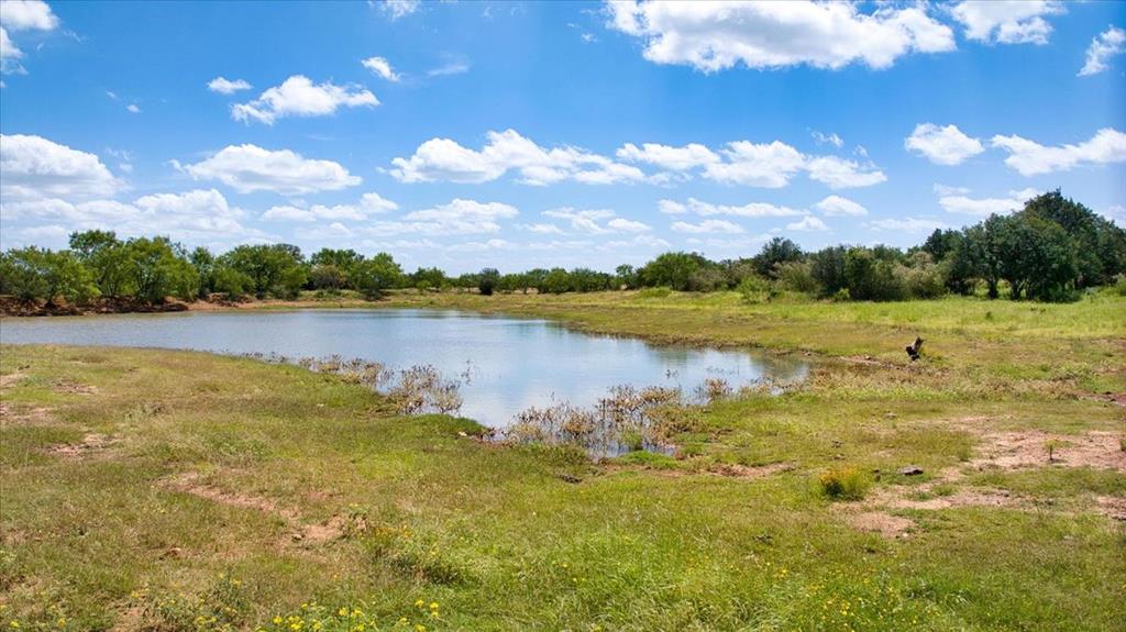 567 Walters Road Mason, TX 76856 - Photo 25 of 26 a view of a lake and a mountain