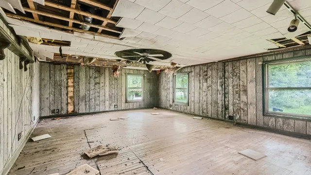 a view of an empty room with a balcony
