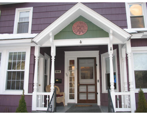 30 Churchill Street Springfield, MA 01108 - Photo 1 of 12 a view of a brick building with a large window