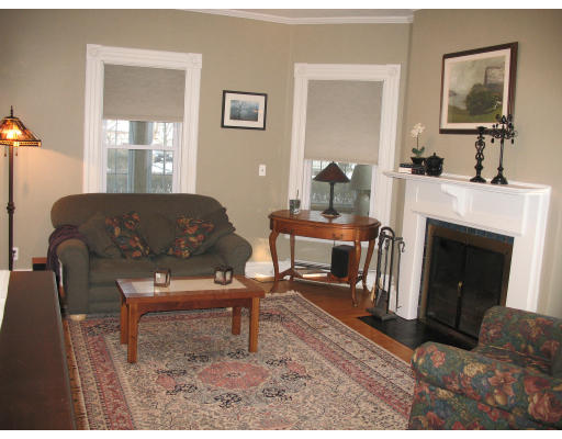 30 Churchill Street Springfield, MA 01108 - Photo 2 of 12 a living room with furniture and a fireplace