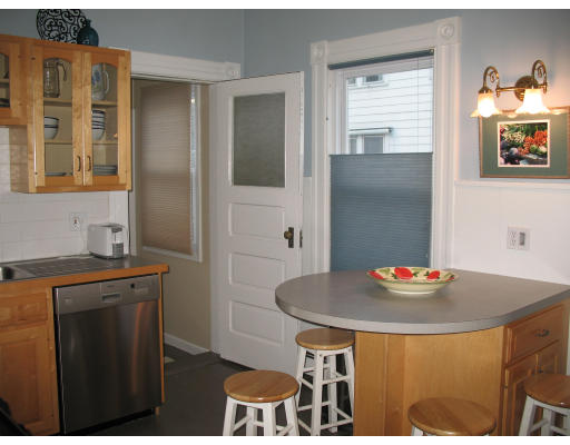 30 Churchill Street Springfield, MA 01108 - Photo 5 of 12 a kitchen with a sink cabinets and counter space