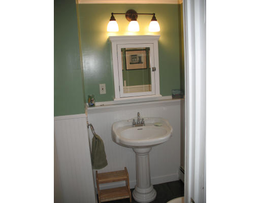 30 Churchill Street Springfield, MA 01108 - Photo 9 of 12 a bathroom with a sink and a mirror