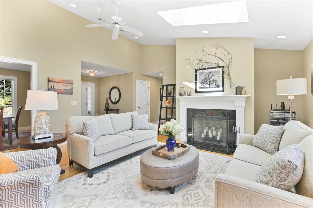 33 Old Reed Road Monson, MA 01057 - Photo 7 of 42 a living room with furniture and a fireplace