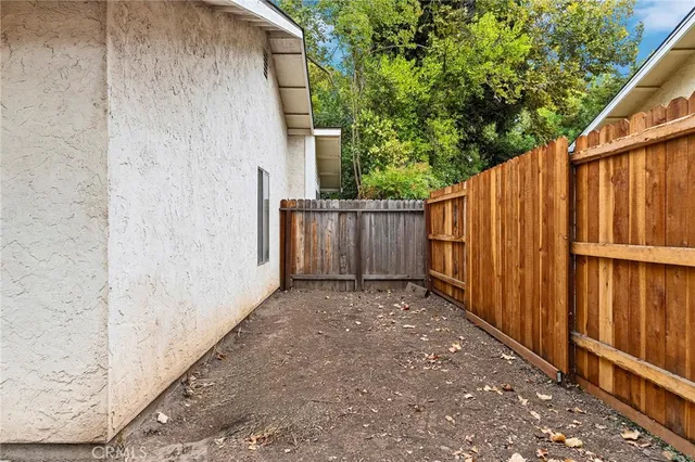 a view of a wooden fence