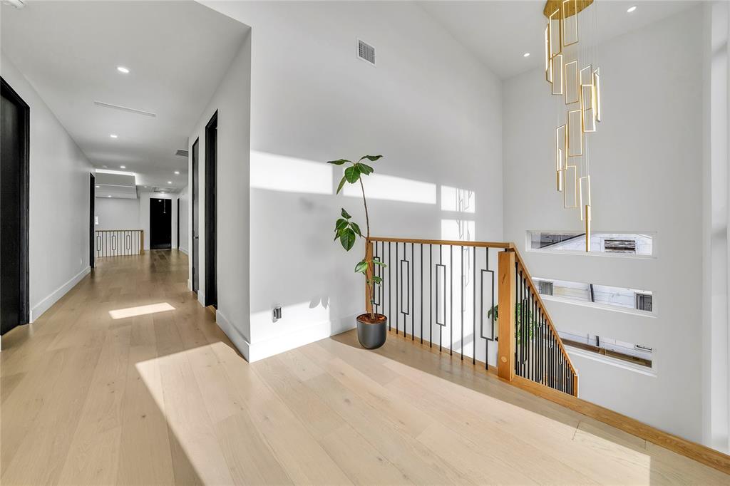 4721 Linnet Lane Dallas, TX 75209 - Photo 19 of 40 a view of a hallway with seating area