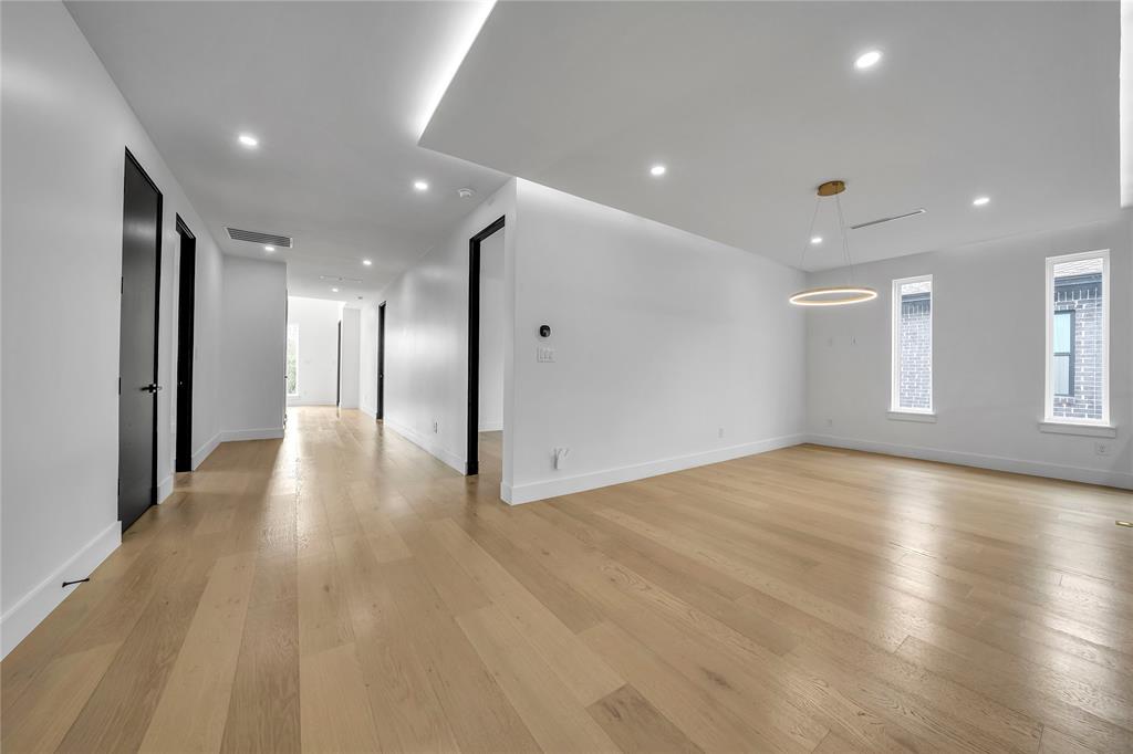 4721 Linnet Lane Dallas, TX 75209 - Photo 28 of 40 a view of empty room with wooden floor
