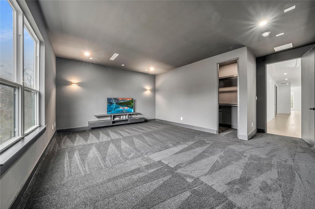 4721 Linnet Lane Dallas, TX 75209 - Photo 30 of 40 a view of a big room with closet and windows