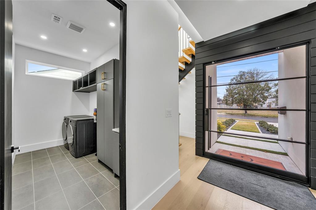 4721 Linnet Lane Dallas, TX 75209 - Photo 32 of 40 a bedroom with a bed and a window