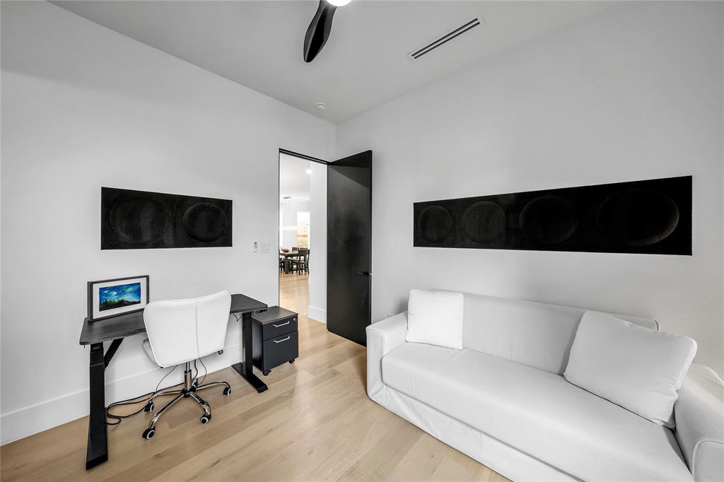 4721 Linnet Lane Dallas, TX 75209 - Photo 35 of 40 a living room with furniture and a flat screen tv