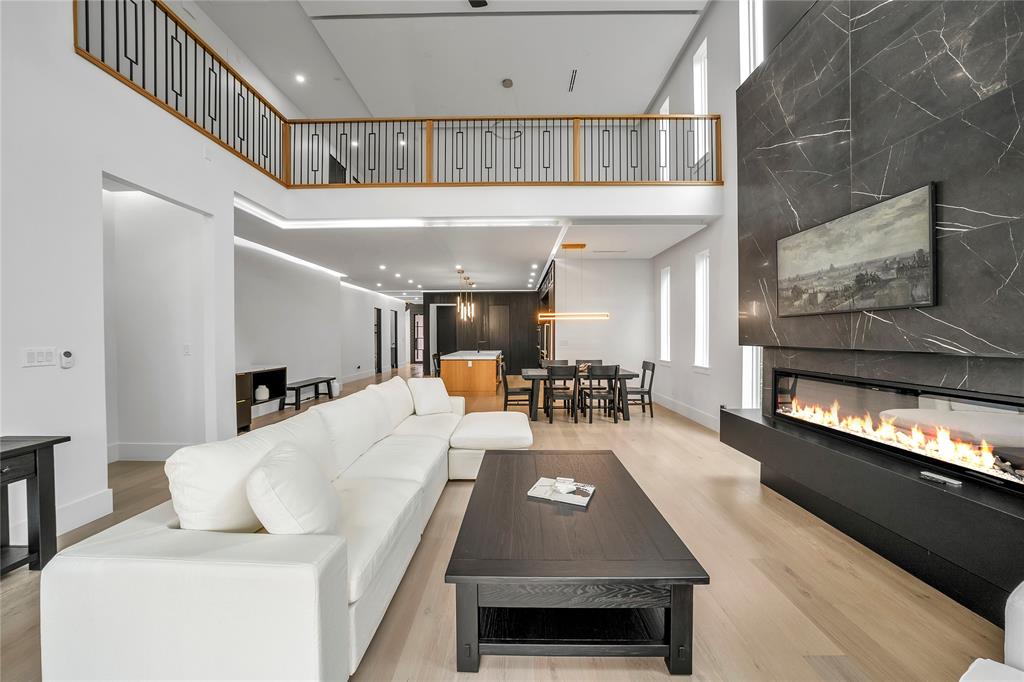 4721 Linnet Lane Dallas, TX 75209 - Photo 7 of 40 a living room with furniture and a flat screen tv