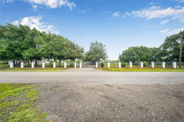 a view of swimming pool with an outdoor space and seating area