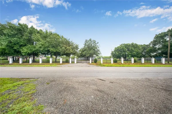 a view of swimming pool with an outdoor space and seating area