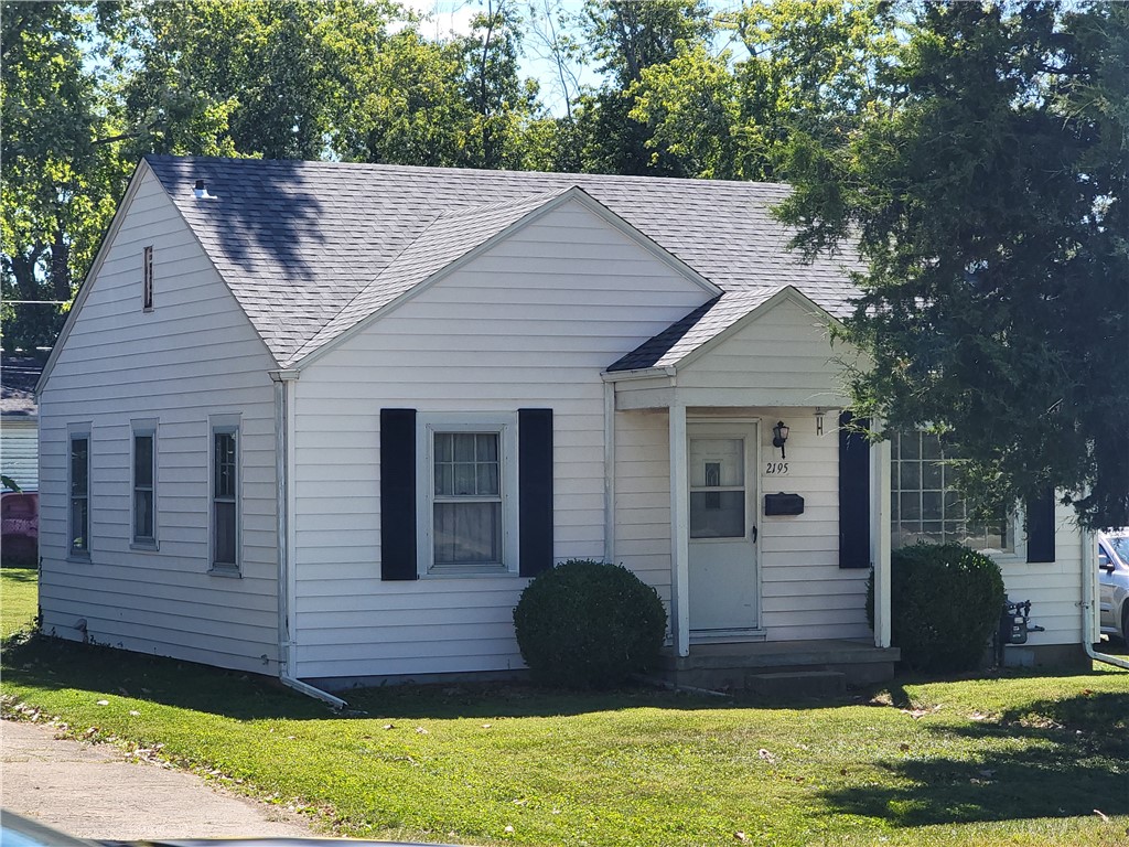 2195 West Center Street Decatur, IL 62526 - Photo 2 of 21 a view of a house with a backyard