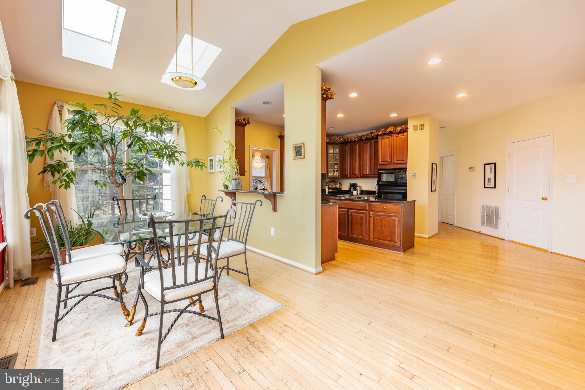 11 Manor Spring Court Silver Spring, MD 20906 - Photo 12 of 45 a view of a kitchen and dining room