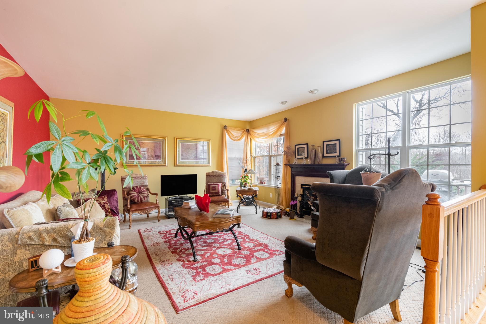 11 Manor Spring Court Silver Spring, MD 20906 - Photo 14 of 45 a living room with fireplace furniture and a flat screen tv
