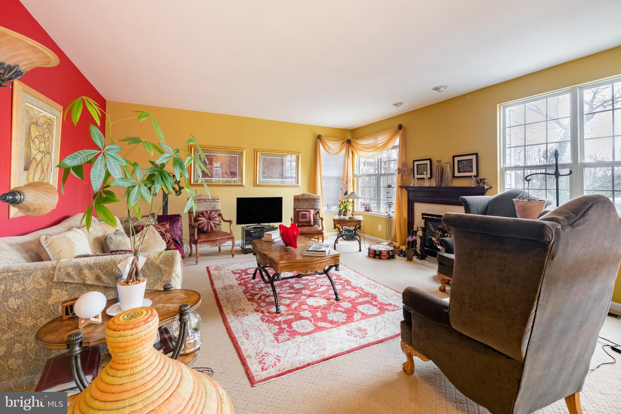 11 Manor Spring Court Silver Spring, MD 20906 - Photo 15 of 45 a living room with furniture fireplace and a large window