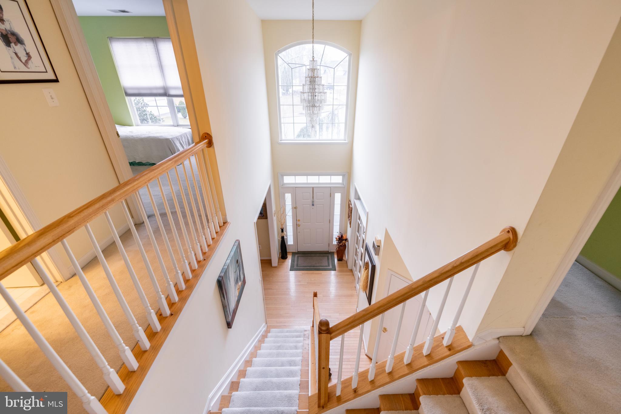 11 Manor Spring Court Silver Spring, MD 20906 - Photo 22 of 45 a view of entryway and hall with wooden floor