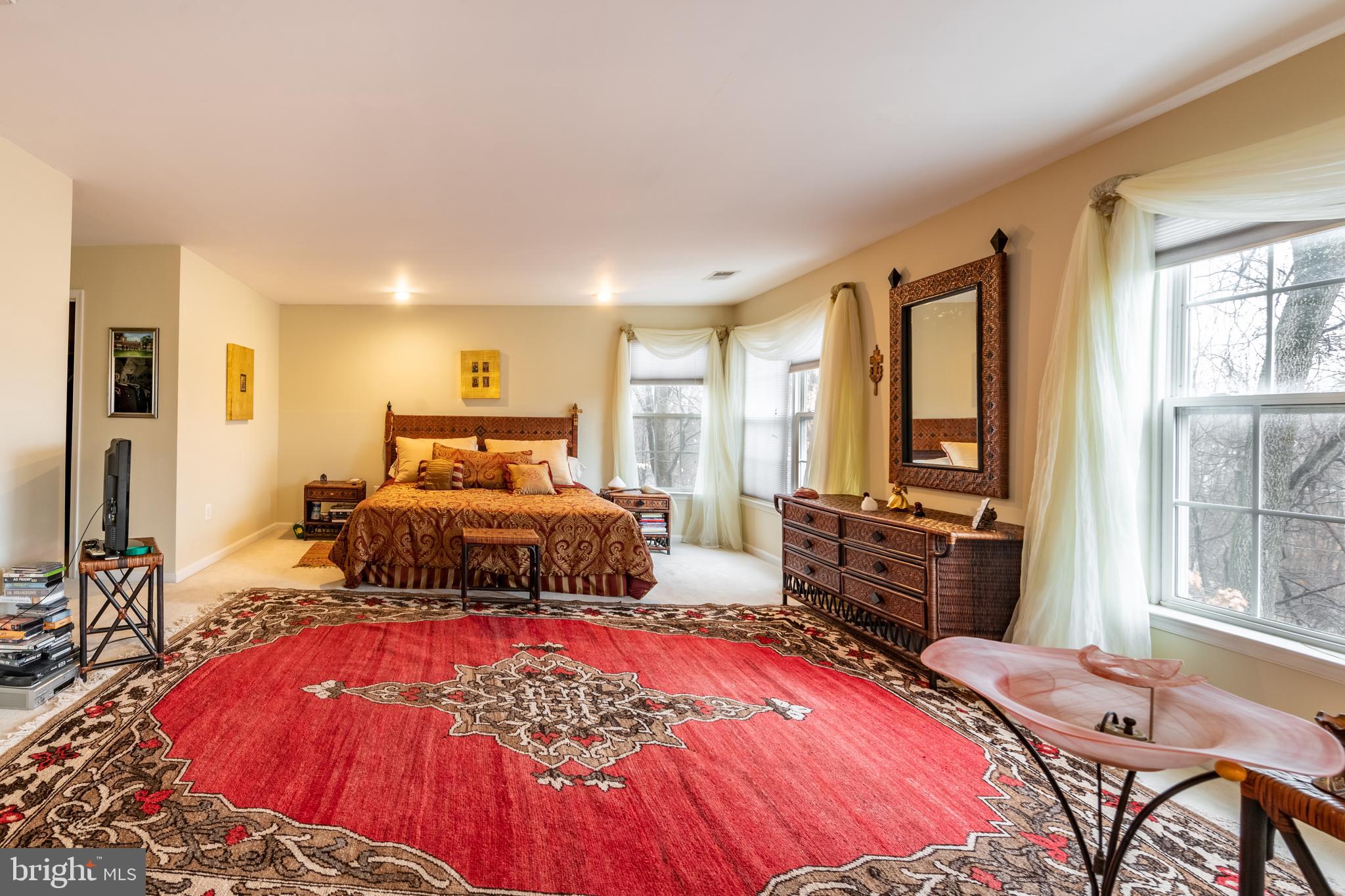 11 Manor Spring Court Silver Spring, MD 20906 - Photo 26 of 45 a bedroom with a bed and wooden floor