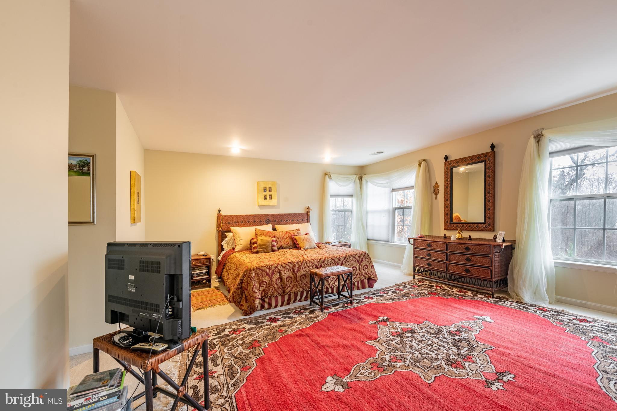 11 Manor Spring Court Silver Spring, MD 20906 - Photo 27 of 45 a bedroom with two beds and large window