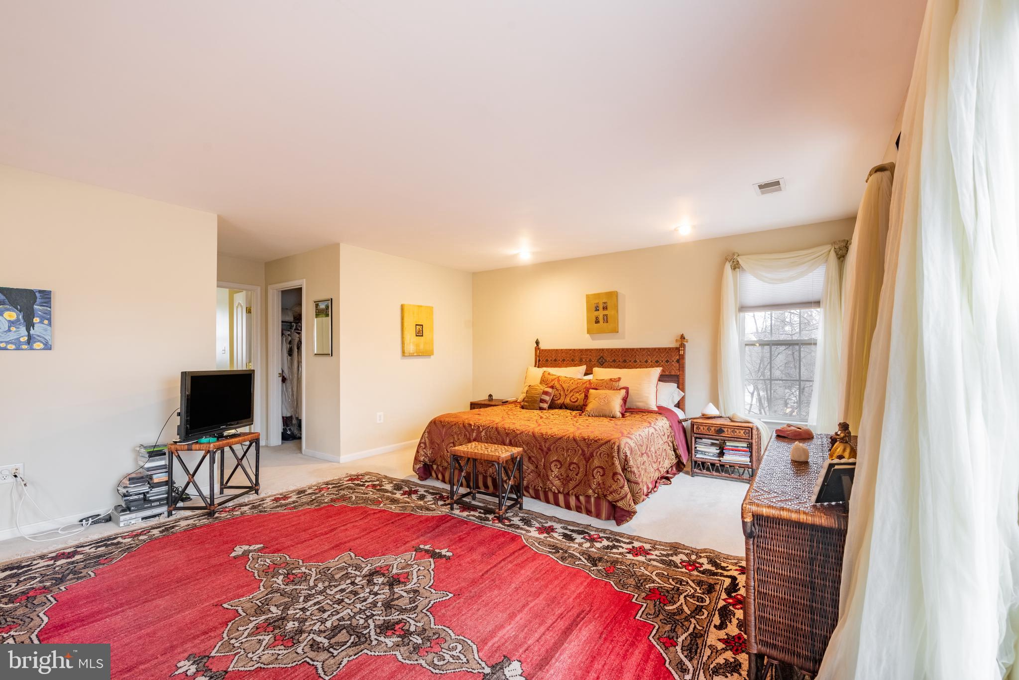 11 Manor Spring Court Silver Spring, MD 20906 - Photo 28 of 45 a bedroom with two bed and a flat screen tv