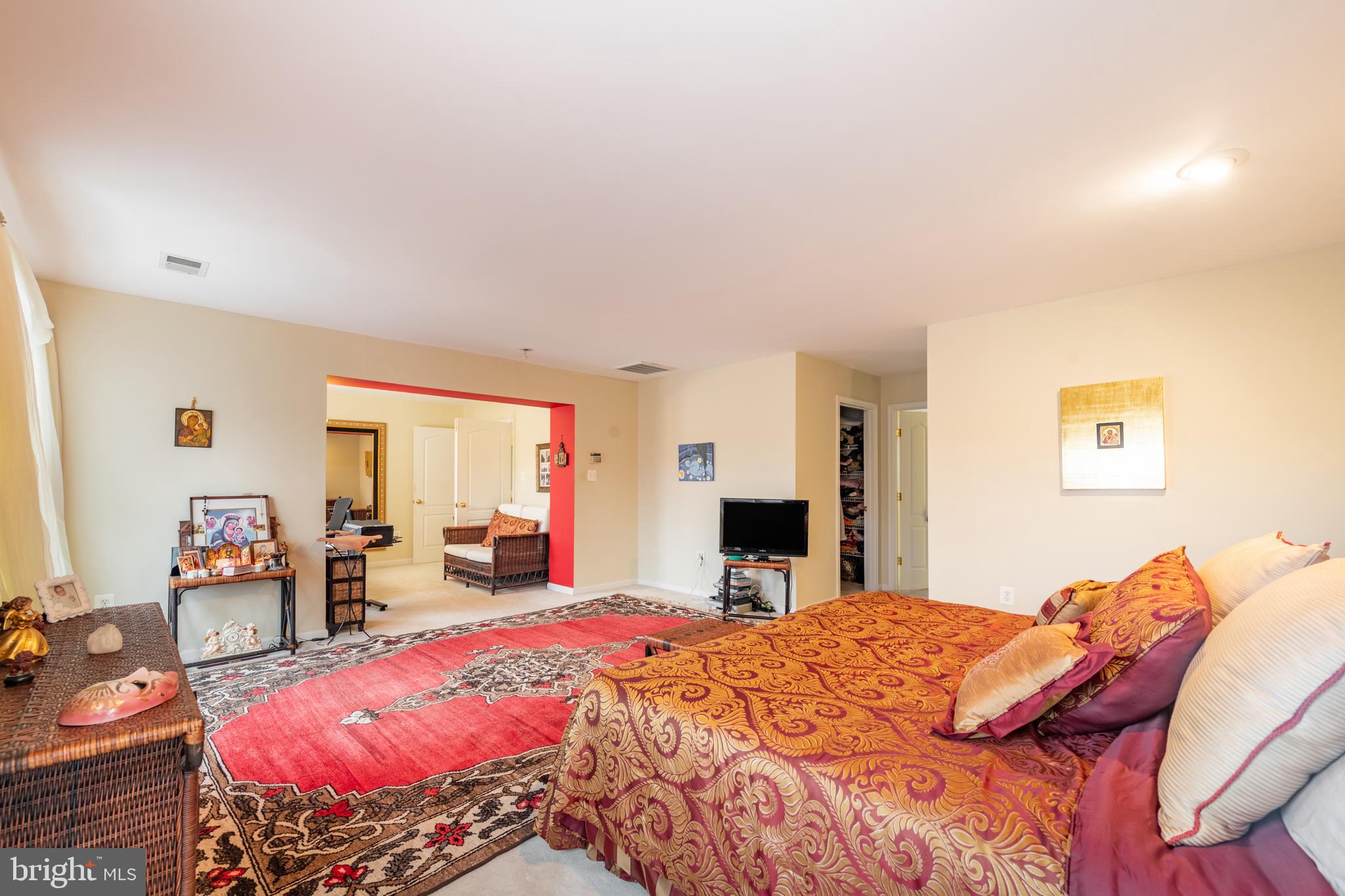 11 Manor Spring Court Silver Spring, MD 20906 - Photo 29 of 45 a bed room with a bed and a table