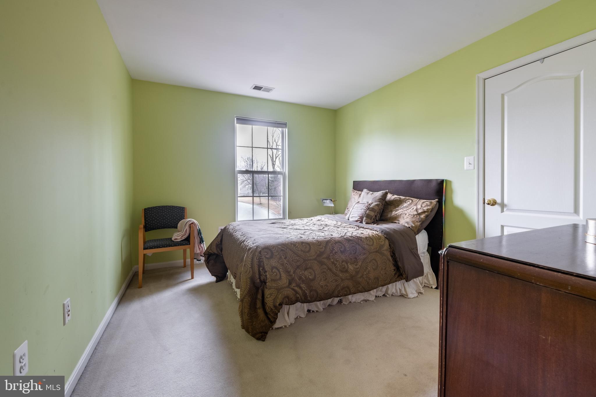 11 Manor Spring Court Silver Spring, MD 20906 - Photo 38 of 45 a bedroom with a bed and a window