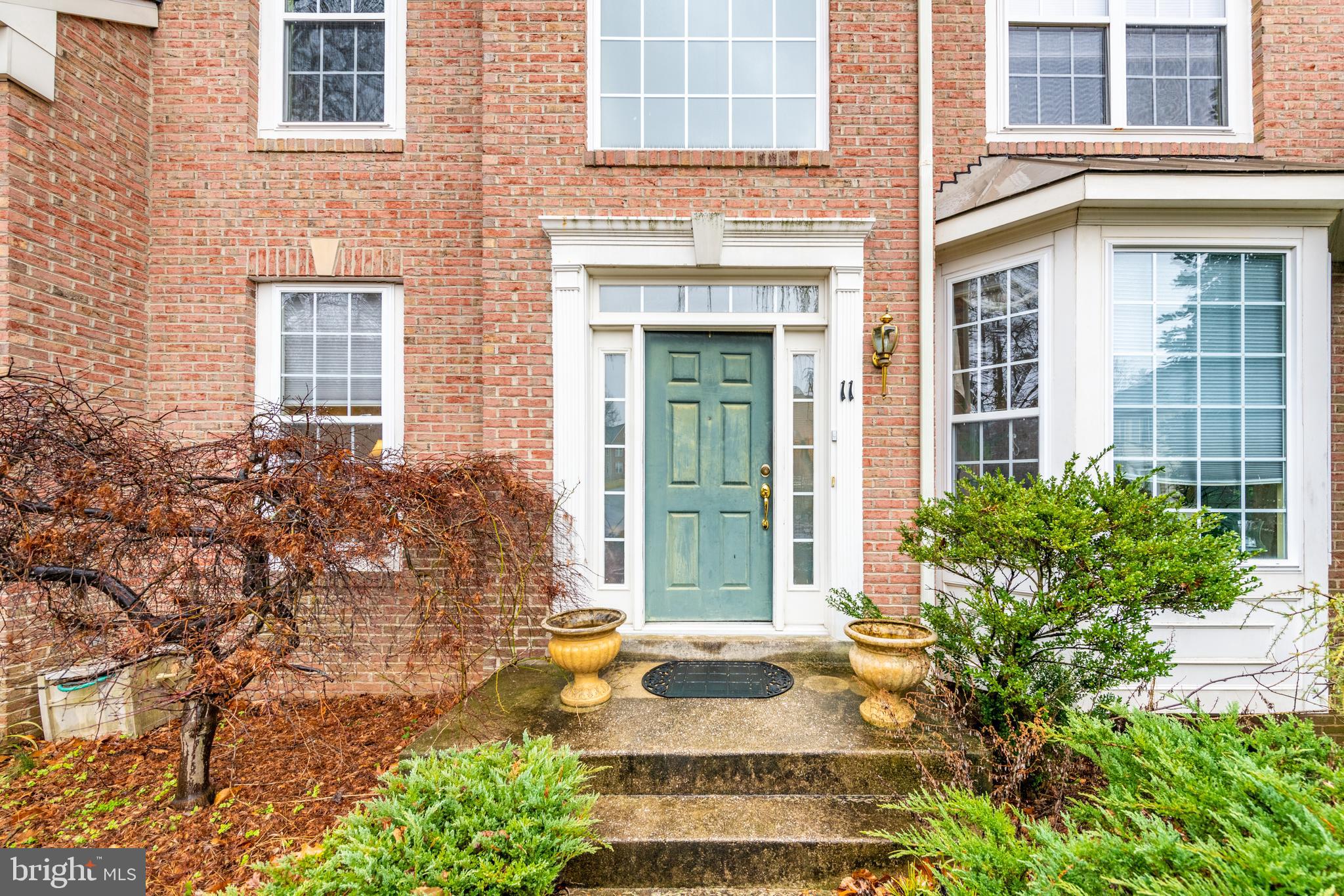 11 Manor Spring Court Silver Spring, MD 20906 - Photo 45 of 45 a front view of a house with a yard