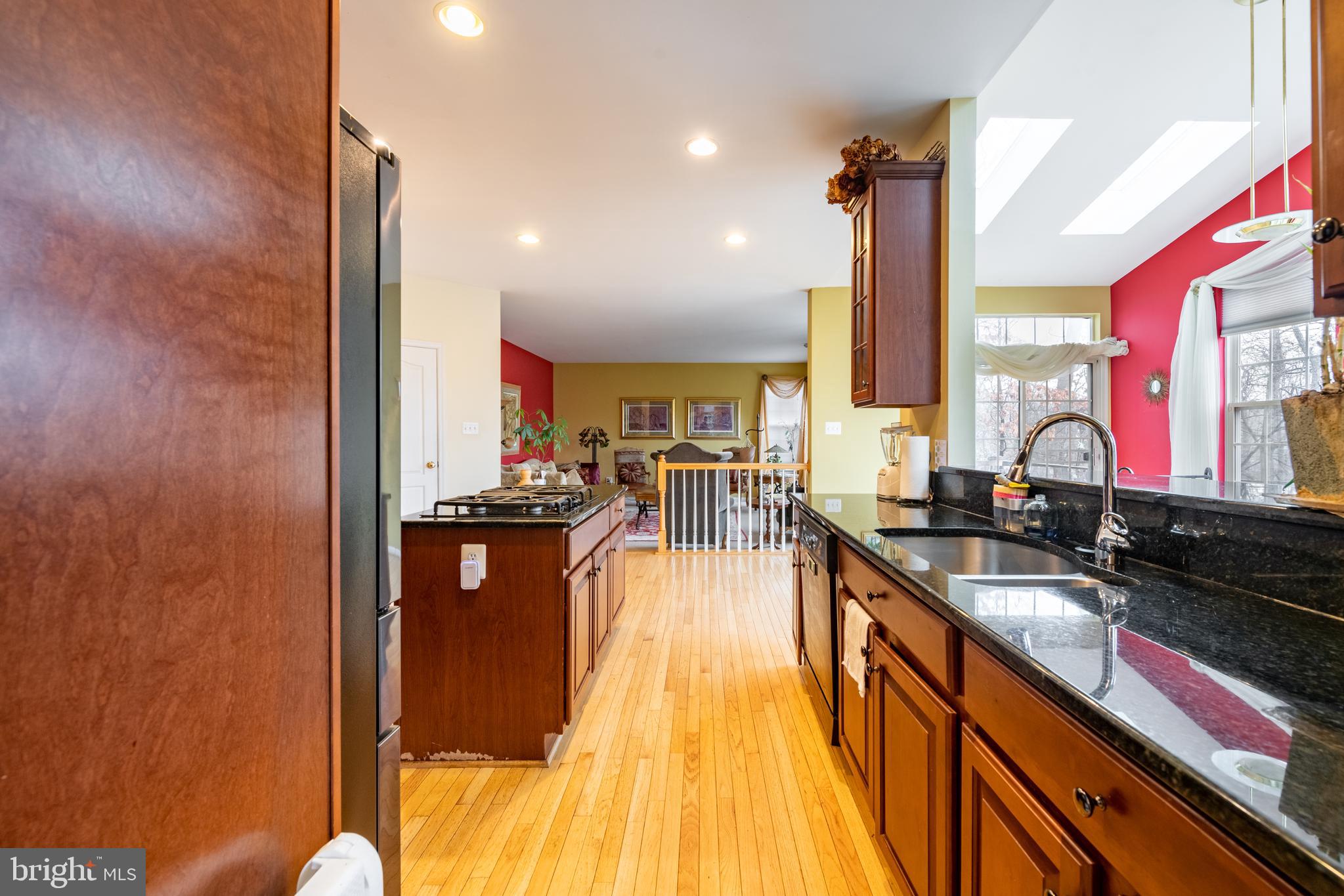 11 Manor Spring Court Silver Spring, MD 20906 - Photo 7 of 45 a kitchen with counter top space a sink and appliances