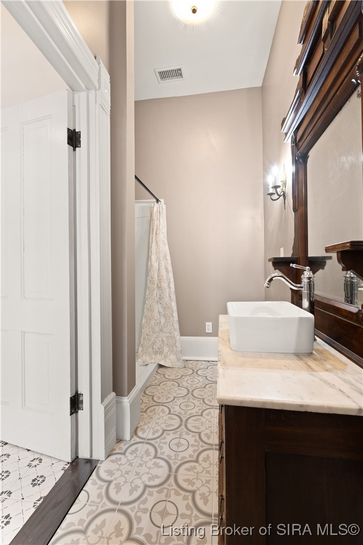 427 East Chestnut Street Corydon, IN 47112 - Photo 11 of 63 2nd full bathroom w/ walk-in shower, decorative tile.