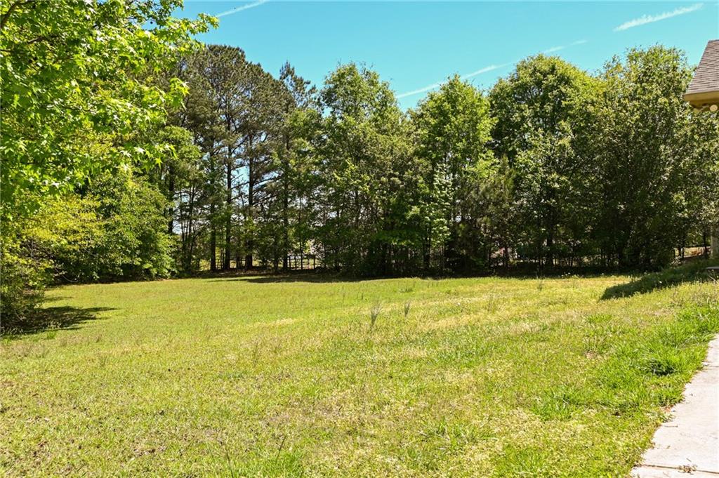 2755 Langley Road Southwest Loganville, GA 30052 - Photo 14 of 49 a view of an outdoor space and a yard
