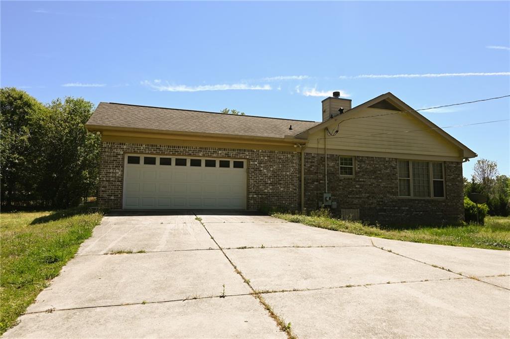 2755 Langley Road Southwest Loganville, GA 30052 - Photo 15 of 49 a front view of house with yard