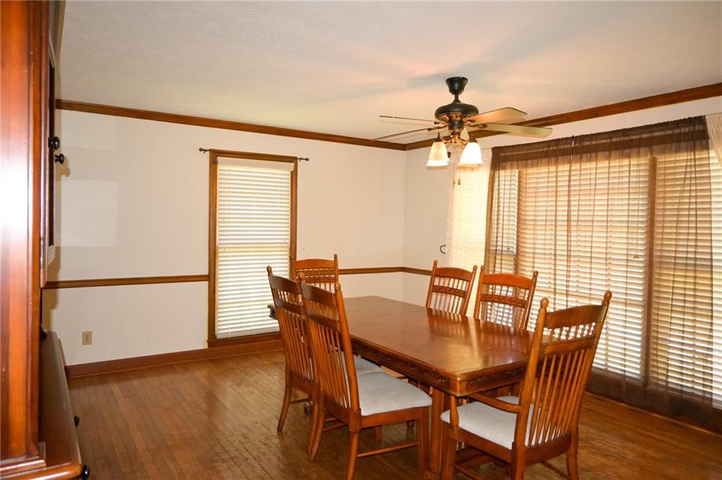 2755 Langley Road Southwest Loganville, GA 30052 - Photo 20 of 49 a dining room with furniture and window