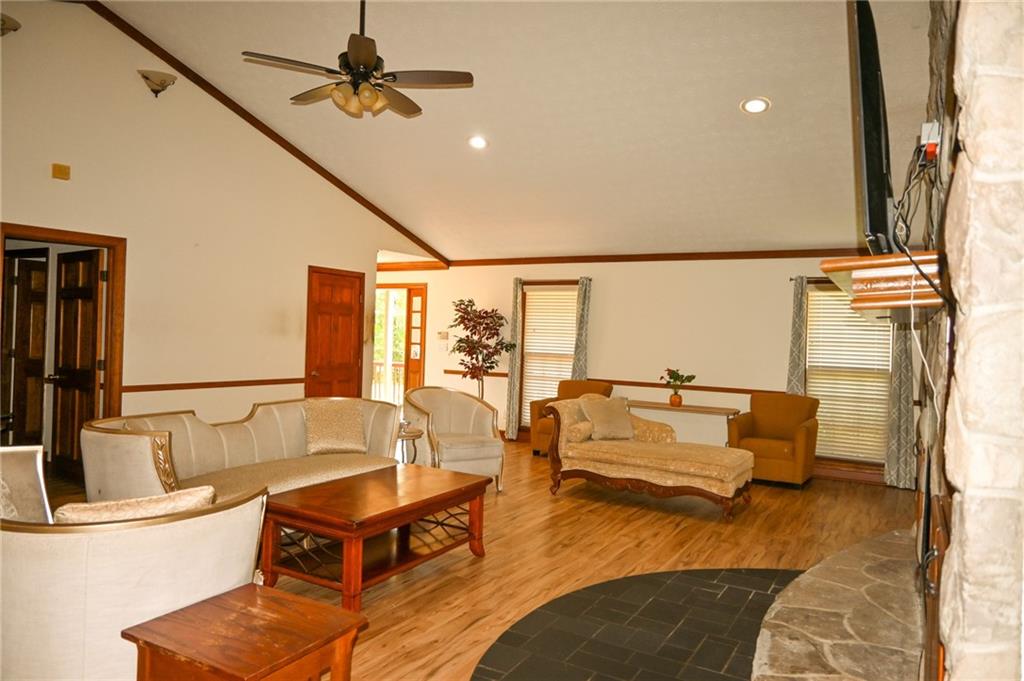 2755 Langley Road Southwest Loganville, GA 30052 - Photo 25 of 49 a living room with furniture and a flat screen tv