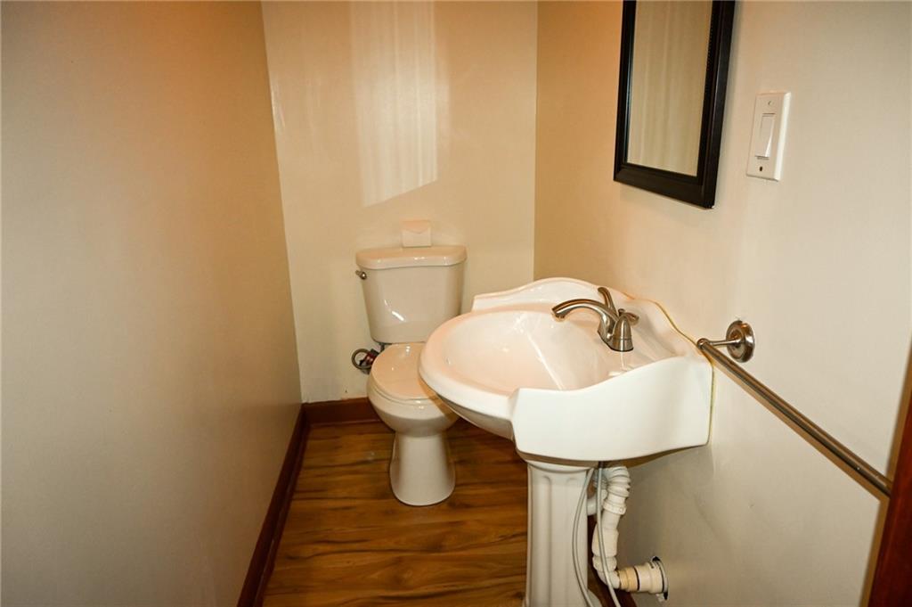 2755 Langley Road Southwest Loganville, GA 30052 - Photo 29 of 49 a bathroom with a sink and a toilet