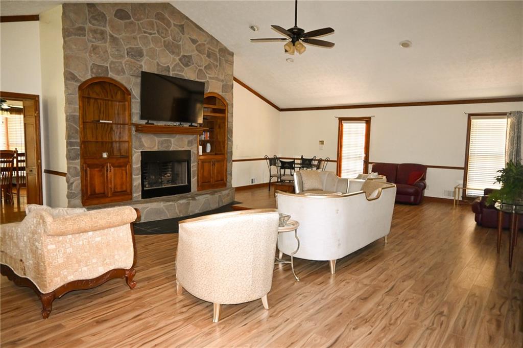 2755 Langley Road Southwest Loganville, GA 30052 - Photo 42 of 49 a living room with furniture and a fireplace