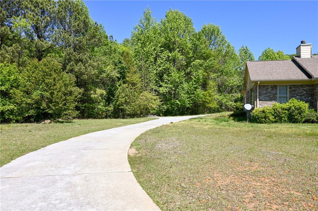2755 Langley Road Southwest Loganville, GA 30052 - Photo 47 of 49 a view of a backyard