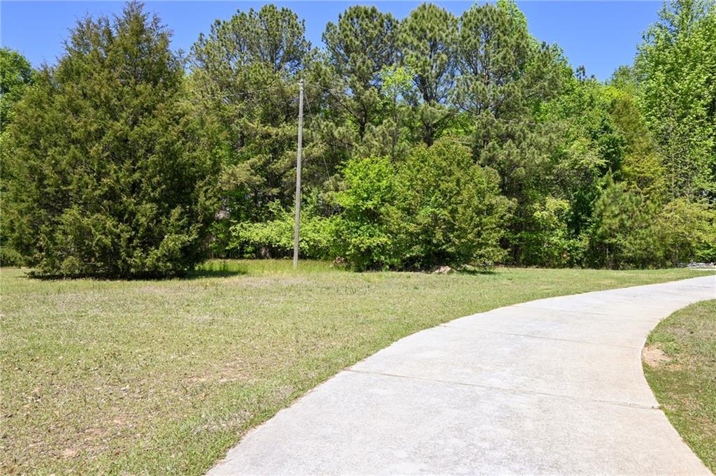 2755 Langley Road Southwest Loganville, GA 30052 - Photo 48 of 49 a view of a back yard