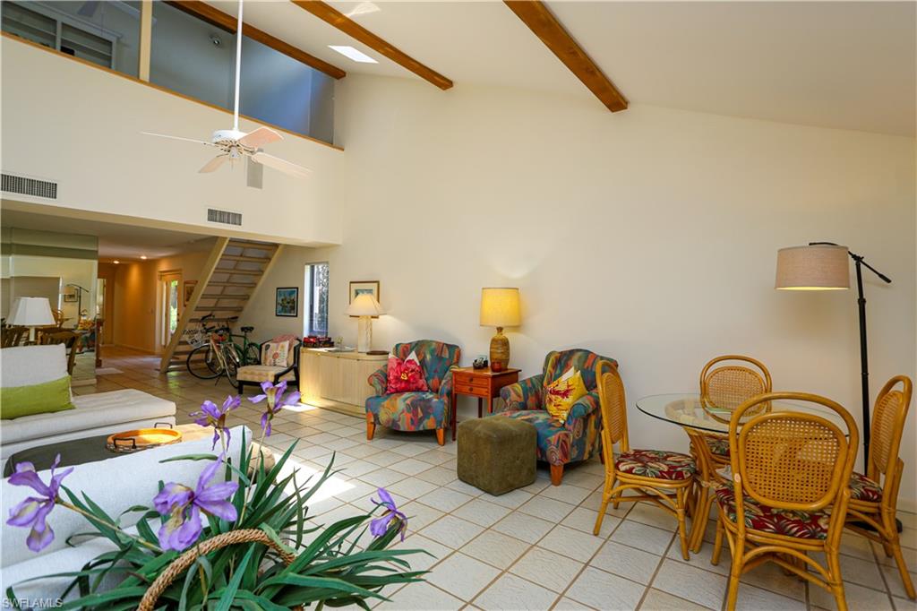 550 3rd Avenue North Naples, FL 34102 - Photo 13 of 48 a living room with patio furniture