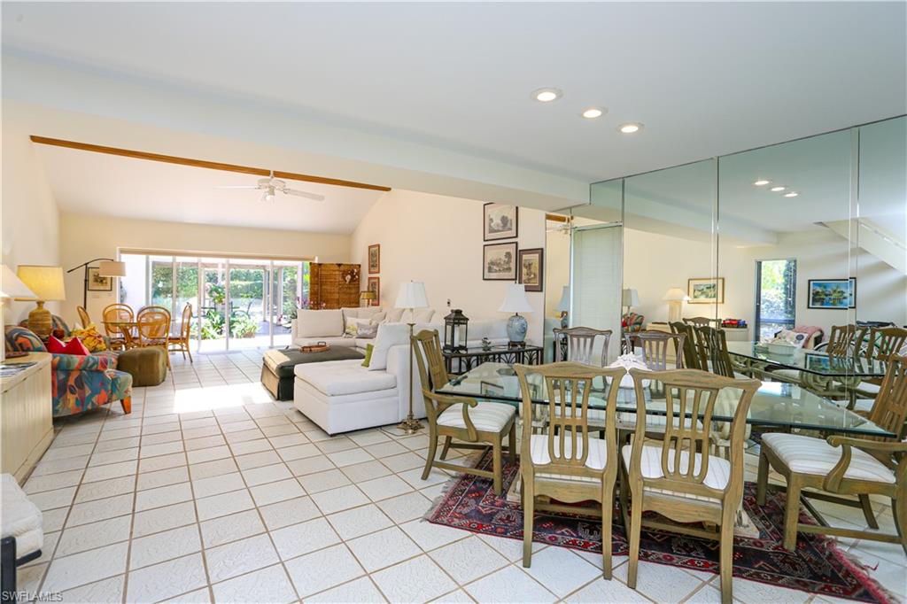 550 3rd Avenue North Naples, FL 34102 - Photo 16 of 48 a view of a dining room with furniture