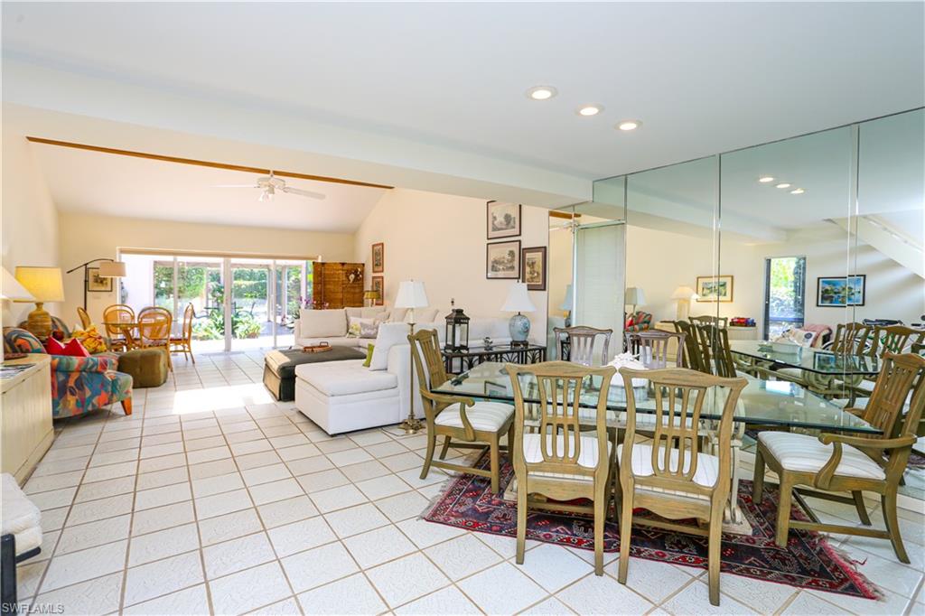 550 3rd Avenue North Naples, FL 34102 - Photo 20 of 48 a view of a dining room with furniture