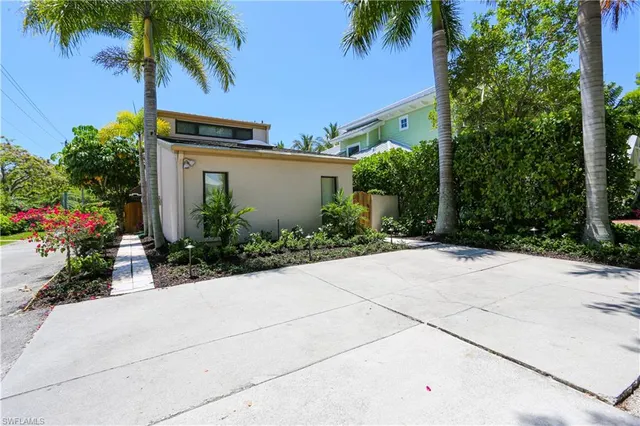 a view of a garden with potted plants