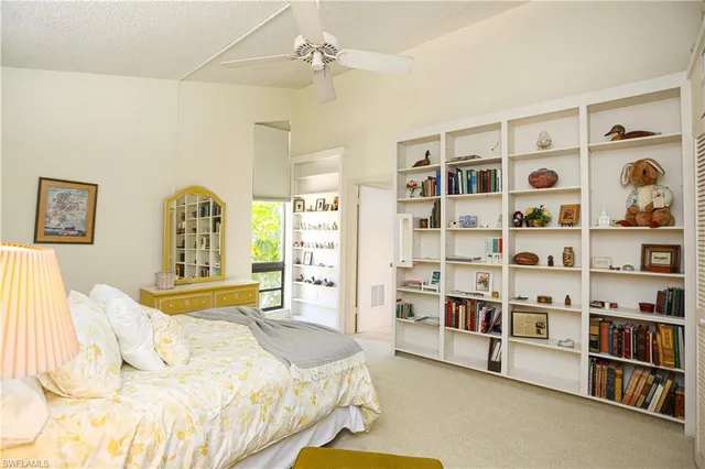 a bedroom with a bed and closet