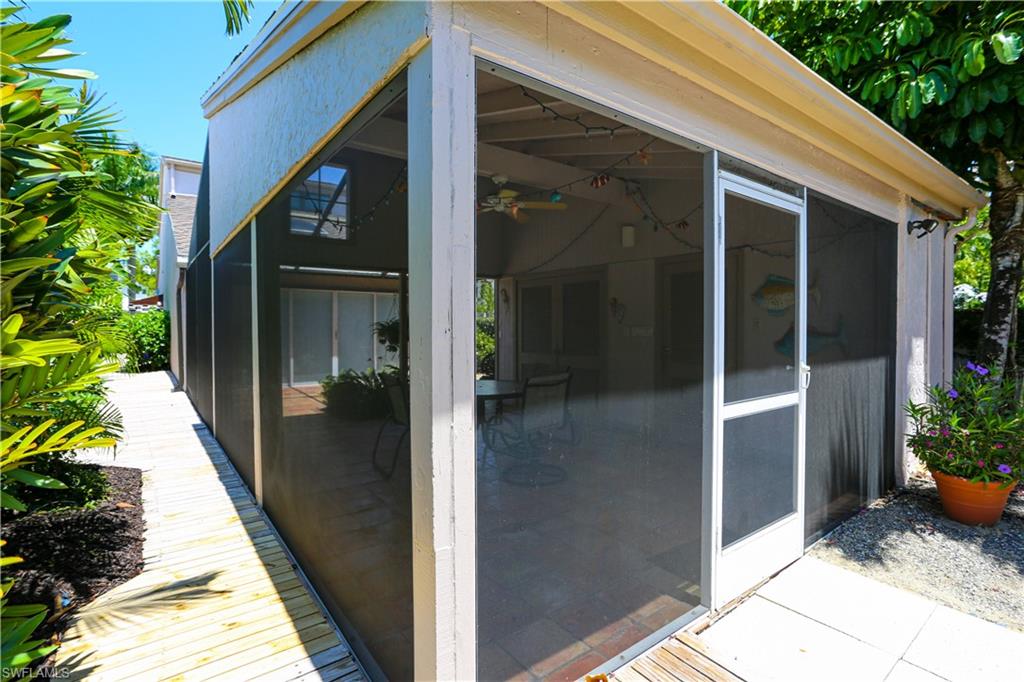 550 3rd Avenue North Naples, FL 34102 - Photo 41 of 48 a view of a entryway door front of house