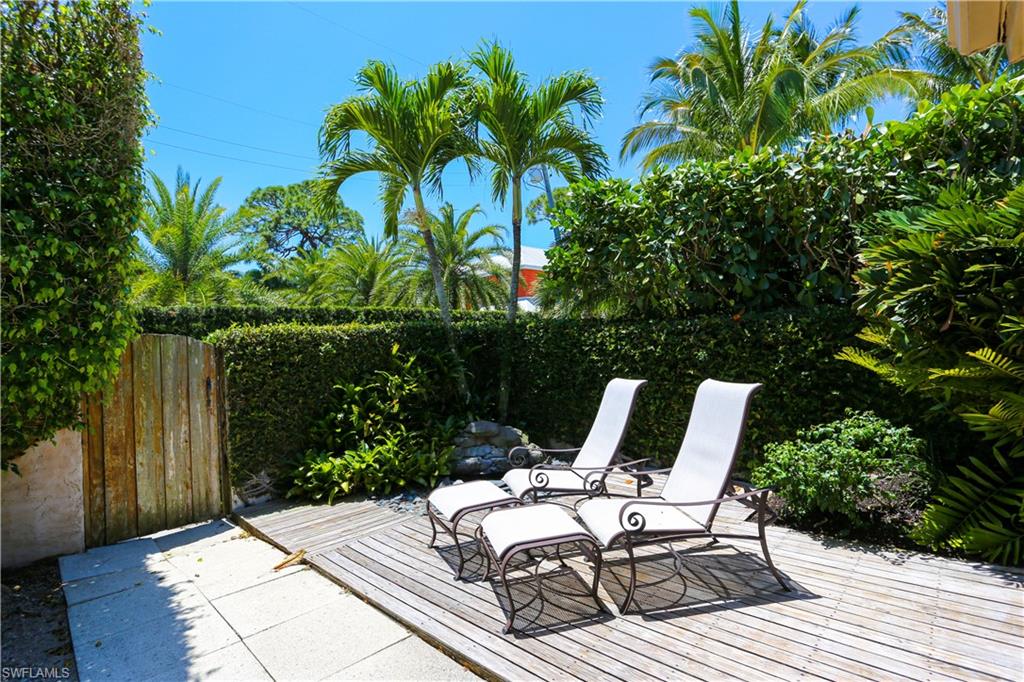 550 3rd Avenue North Naples, FL 34102 - Photo 42 of 48 a view of backyard with sitting area