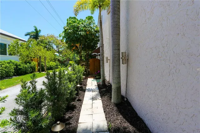 a view of a pathway with a yard