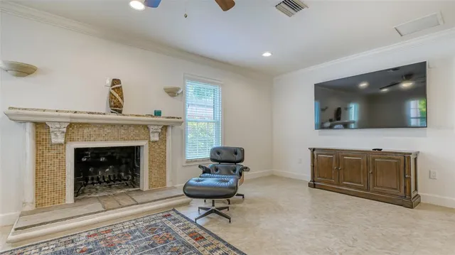 a living room with furniture and windows